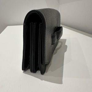 Matt & Natt vegan leather clutch. The perfect hand held clutch to add some flare